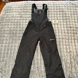 Arctix Black Winter Bib Overalls with Durable Material
A2